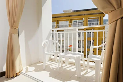 Quadruple Room with Balcony — Garden Phuket Hotel